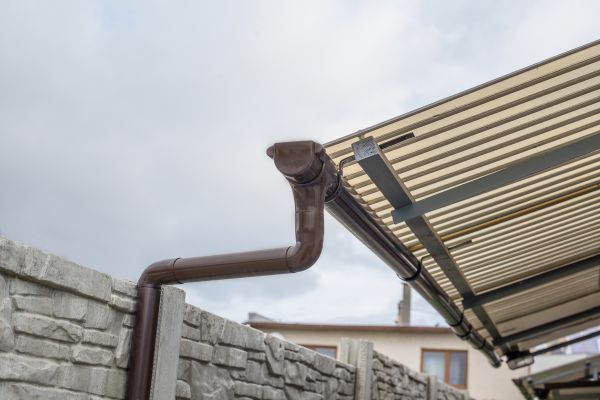 Plastic Downspout Installation in Show Low